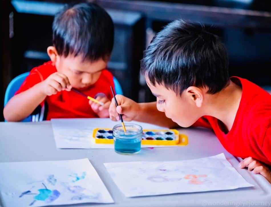 2 kids writing