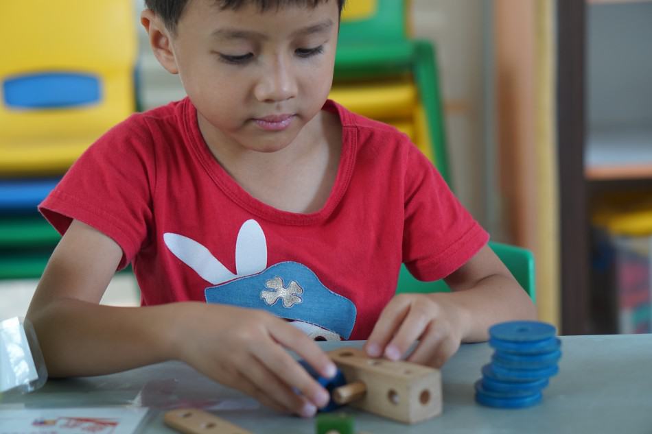 playing with blocks and working