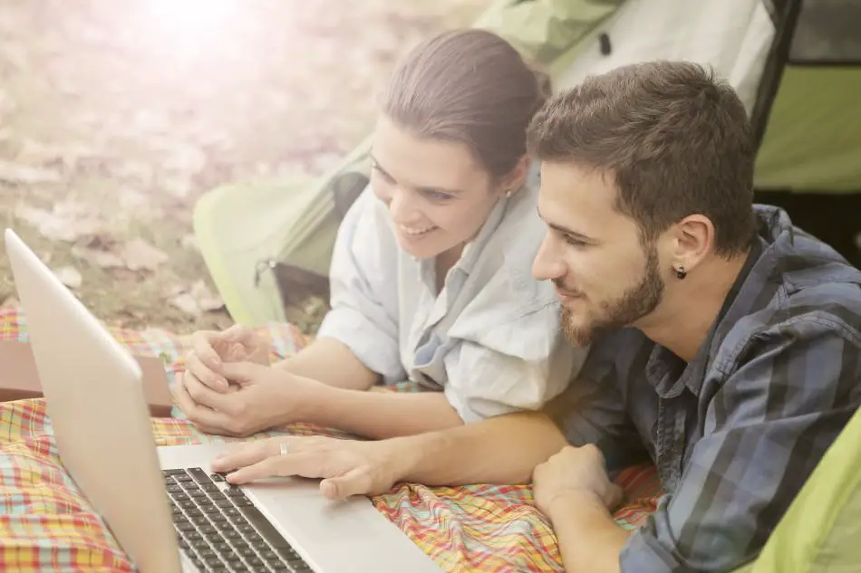 a-happy-couple-using-computer-laptop