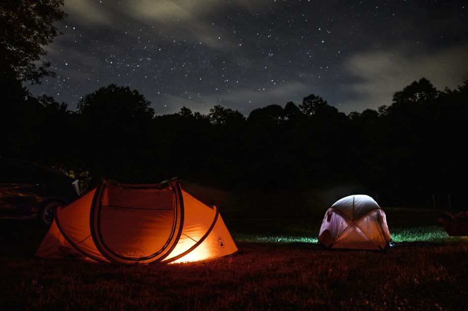 two-lighted-dome-tent-during-nighttime